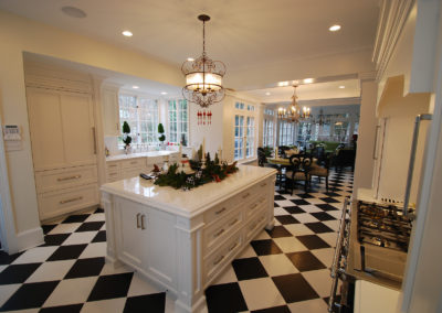 Black and white checkered tile floor in kitchen remodel with center island by Moorestown NJ remodeling company