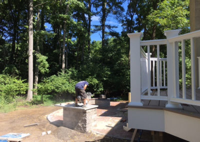 Moorestown NJ contractor building a new paver patio with outdoor kitchen and firepit
