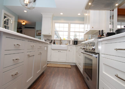 Kitchen remodel with farmhouse sink custom island white cabinets and drawers Moorestown NJ