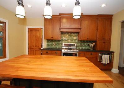 Butcher block countertop on custom island with pendant lighting Moorestown NJ