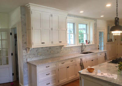 Kitchen remodel with custom white cabinetry and arabesque tile backsplash Moorestown NJ