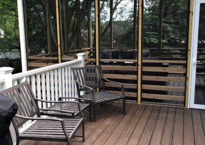 New wood railings and sunroom framed by Moorestown NJ contractor