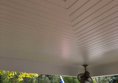 Covered porch with shiplap ceiling