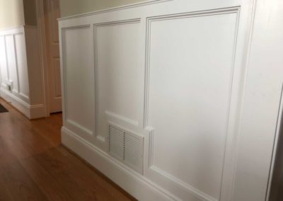 Custom Wainscoting by Moorestown NJ construction company lines the hallway