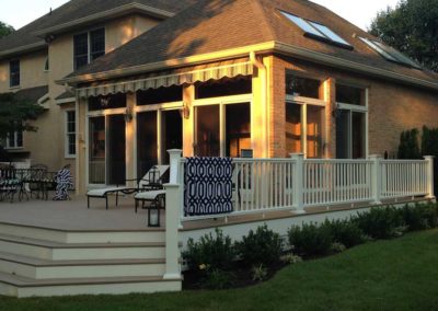 Beautiful back deck with wraparound steps overlooking the backyard by Moorestown NJ contractor