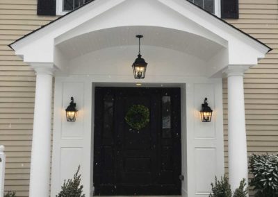 The addition of a new front portico transformed the entryway of this home.