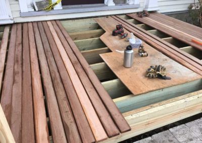 Installation of new wood flooring on a front porch in historic Moorestown NJ