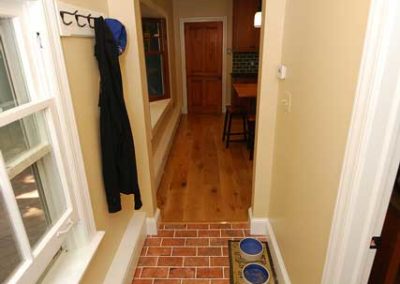 Hallway adjacent to the kitchen transformed into a functional mudroom by Moorestown NJ contractor