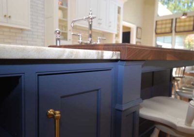 Kitchen remodel by Moorestown NJ contractor features a spacious custom kitchen island with marble and butcher block countertops