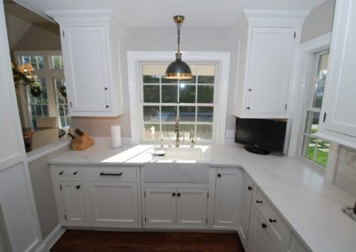 Pendant lighting over marble front under-mount sink in Moorestown, NJ kitchen remodel