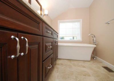 Dark wood bathroom vanity and soaking tub Moorestown NJ