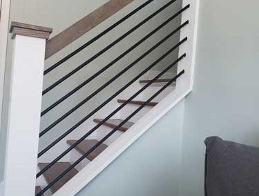 Clean modern staircase transforms this space