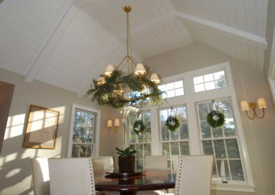 White shiplap installed by Moorestown NJ construction company lines this elegant vaulted ceiling