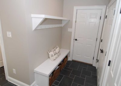 Ceramic tile flooring installation by Moorestown NJ home remodeling company is a durable addition to a mud room