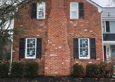 New windows installed on a brick facade by Moorestown, NJ contractor