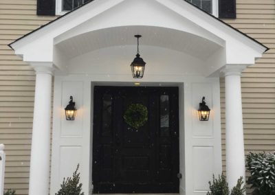 Completed front porch portico addition lends a stately presence to this home